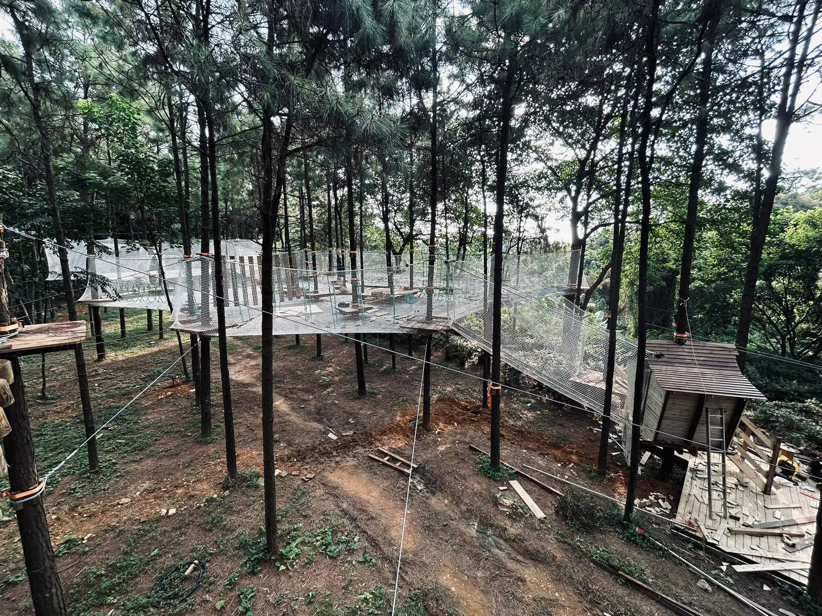 Net walkway and cabin under construction, Xiqiao Mountain